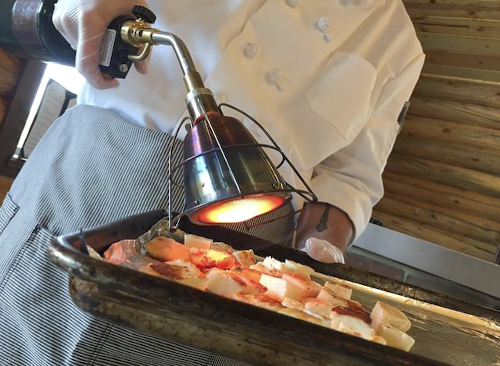 chef chris spear using the searzall on cheese at orchid cellar meadery